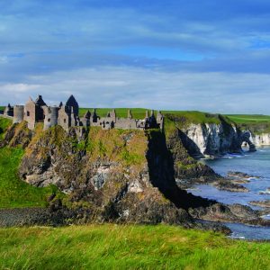Dunluce Castle is sited dramatically close to the edge of a headland, along the North Antrim coast. Surrounded by jaw dropping coastal scenery, this medieval castle stands where an early Irish fort was once built and where its history can be traced back to early Christians and Vikings.