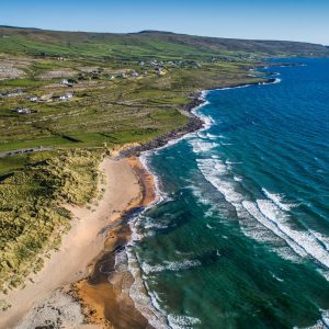 Fanore Beach, Fanore, Co Clare_master Fanore Beach is located in Fanore, County Clare, on the Wild Atlantic Way, and is a fine blue-flag beach with an extensive sand dune system. It is popular for bathing and water activities.